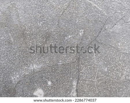 Aged old cement crack wall texture background 