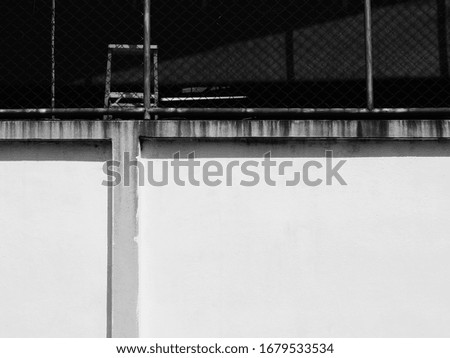 Similar – boy leaning on fence