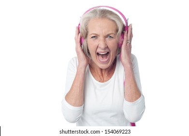 Aged woman screaming out of excitement