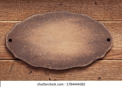 Aged Wooden Nameplate At Wood Board Background Texture Surface