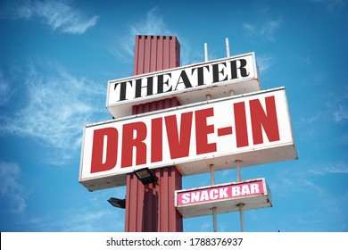 Aged and worn vintage drive-in movie theater sign                        