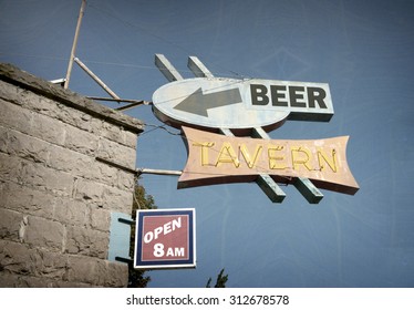 Aged And Worn Vintage Photo Of Beer Tavern Neon Sign