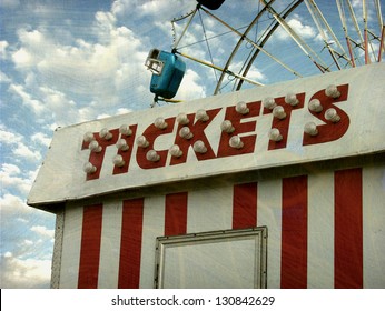 Aged And Worn Vintage Photo Of Carnival Ride And Ticket Booth