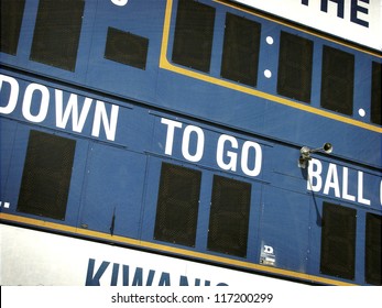 Aged And Worn Vintage Photo Of Football Scoreboard