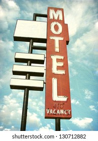 Aged And Worn Vintage Photo Of Motel Sign