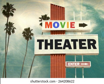 Aged And Worn Vintage Photo Of Movie Theater Sign With Palm Trees