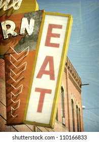 Aged And Worn Vintage Photo Of Neon Eat Sign