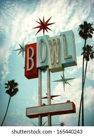 Aged And Worn Vintage Photo Of Retro Neon Bowling Alley Sign                               