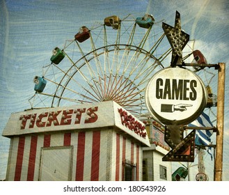 Aged And Worn Vintage Photo Of Retro Carnival With Games Sign                                