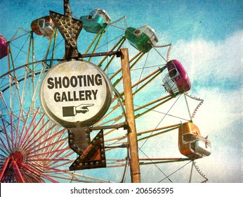 Aged And Worn Vintage Photo Of Shooting Gallery Sign At Carnival                                