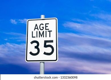 Ageism discrimination concept sign with blue sky
