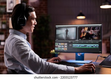 Agency freelancer editing video footage on computer software, using color grading and visual effects to create film montage. Working on movie edit for multimedia production at home. - Shutterstock ID 2203123777