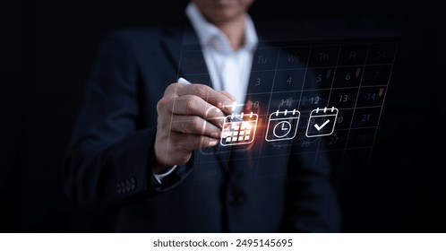 Agenda for Business Planning Calendar: Concept of Work Schedule, Businessman annotate the workflow plan, virtual calendar, and Keep essential dates and schedules organized. Time management at work - Powered by Shutterstock