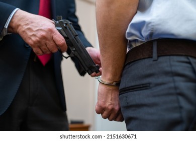 Agent Arresting A Businessman In His Office