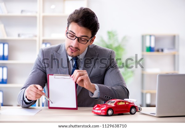 Agent offering car motor\
insurance
