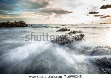 Aggresive tide attack on rocks at Koh Larn, Chonburi province, Thailand