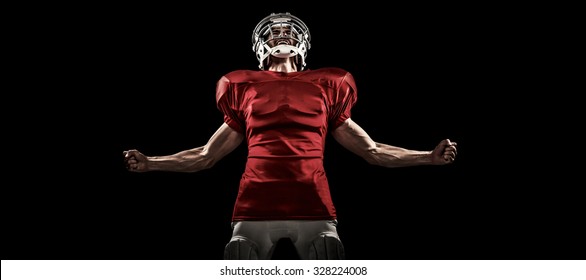 Aggressive American football player in red jersey screaming against black - Powered by Shutterstock