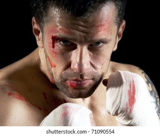 Aggressive boxer with blood on the face