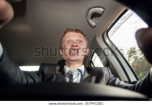 Aggressive driver on the\
road driving a car