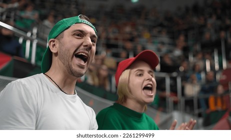 Aggressive fans sport stadium arena. Angry hater close up. Hard loss emotion. Goal fail cup. Guy hate play team game. Bad day mood. Anger people. Annoyed fan girl shout. Irritation man. Person problem - Shutterstock ID 2261299499