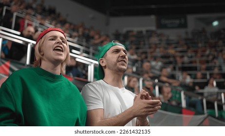 Aggressive fans sport stadium arena. Angry hater close up. Hard loss emotion. Goal fail cup. Guy hate play team game. Bad day mood. Anger people. Annoyed fan girl shout. Irritation man. Person problem - Shutterstock ID 2261432135