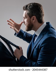 Aggressive Lawyer In Suit Make Threaten Gesture Pulling Man Necktie Grey Background, Threatening