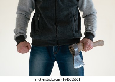 Aggressive Man With An Ax In His Hand On A White Background