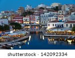 Aghios Nikolaos night view - picturesque town in the eastern of island Crete built on the northwest side of the peaceful bay of Mirabello