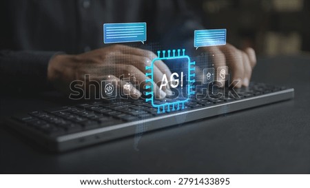 AGI technology concept. Professional using laptop with artificial general intelligence icons, cognitive computing, autonomous systems and digital innovation.