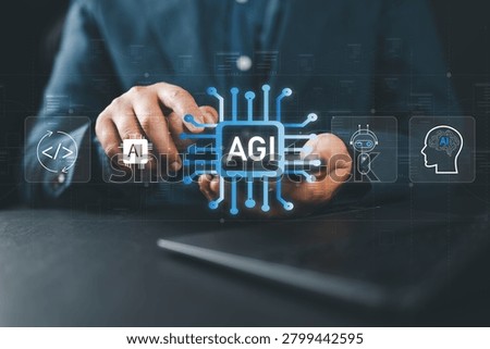 AGI technology concept. Professional using laptop with artificial general intelligence icons, cognitive computing, autonomous systems and digital innovation.