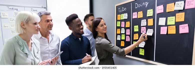 Agile Business Team Using Kanban Task Board