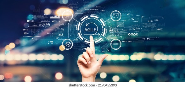 Agile Concept With Hand Pressing A Button On A Technology Screen