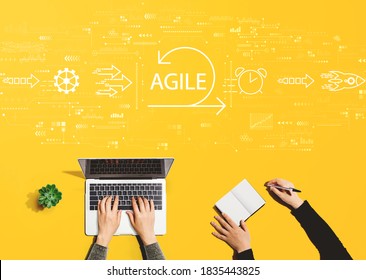 Agile Concept With People Working Together With Laptop And Notebook