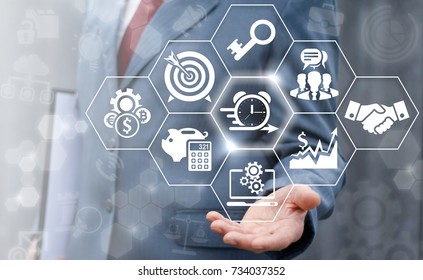 Agile Development (Agility Developing), Time Management, Work Planning Business concept. Businessman offers alarm clock arrow icon on a virtual screen. - Shutterstock ID 734037352