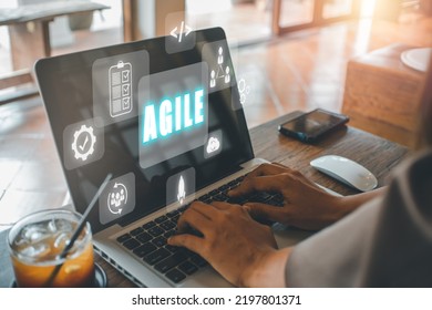 Agile Development Methodology Concept, Business Person Hand Typing Keyboard With VR Screen Agile Icon On Office, Technology Concept.