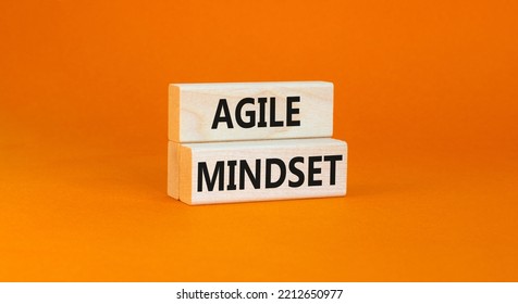 Agile Mindset Symbol. Concept Words Agile Mindset On Wooden Blocks. Beautiful Orange Table Orange Background. Business Flexible And Agile Mindset Concept. Copy Space.