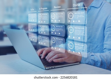 Agile software development or project management using kanban or scrum methodology boards on screen. Process, workflow, visual organisation tools and framework. Developer using laptop computer. - Shutterstock ID 2256820181