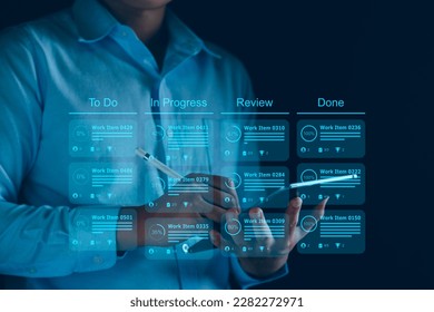 Agile software development or project management using kanban or scrum methodology boards on screen. Process, workflow, visual organisation tools and framework. Developer touching virtual interface. - Shutterstock ID 2282272971