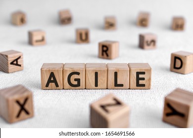 Agile - words from wooden blocks with letters, quickly and easily movement shrewd nimble  agile concept, white background - Shutterstock ID 1654691566