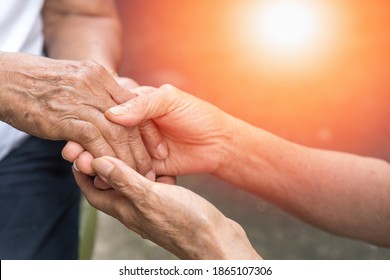 Aging Society With Senior Hand Holding Elder Together In Hospice Care Background. Philanthropy Kindness To Disabled Old People Concept.