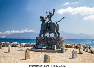 Agios Nikolaos / Greece - September 27, 2018: The statue of Europe is sitting on a bull. Sculpture of Europe, mother of King Minos, riding a bull in Agios Nikolaos, Crete, Greece. 
