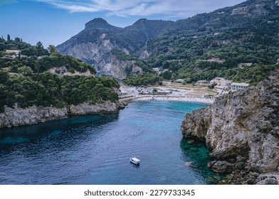 Agios Spyridonas beach in Palaiokastritsa village, Corfu Island, Greece - Shutterstock ID 2279733345
