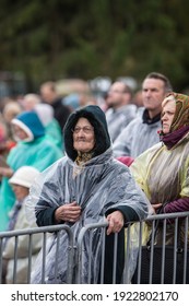 AGLONA, LATVIA - 24.09.2018: His Holiness Rome Pope Francis Visit Aglona. People Wait Pope Francis. Old Woman Pray God