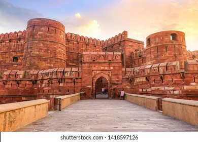 Agra Fort - Historic red sandstone fort of medieval India at sunrise. Agra Fort is a UNESCO World Heritage site in the city of Agra India. - Shutterstock ID 1418597126