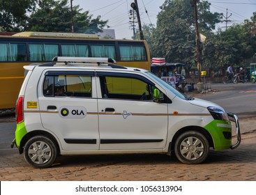 Agra, India - Nov 12, 2017. Ola Car On Street In Agra, India. Agra Is Included On The Golden Triangle Tourist Circuit, Along With Delhi And Jaipur.