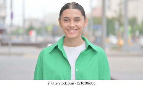 Agree Hispanic Woman Shaking Head In Approval Outdoor