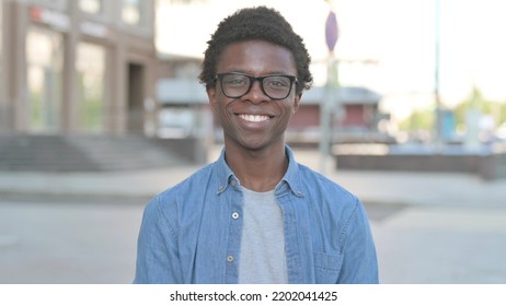 Agree Young African Man Shaking Head In Approval Outdoor