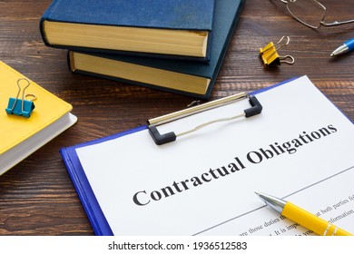 Agreement with Contractual obligations list on the table. - Shutterstock ID 1936512583