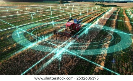 Agricultural autonomous combine harvester, moving across the field, controlled by artificial intelligence, scans the environment. Concept of smart self-driving transport, agriculture of the future.	