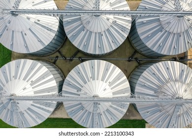 Agricultural Silos On The Farm In Autumn, Close-up Drone View. Industrial Granary, Elevator Dryer, Building Exterior, Storage And Drying Of Grain, Wheat, Corn, Soy, Sunflower. Europe In Hungary